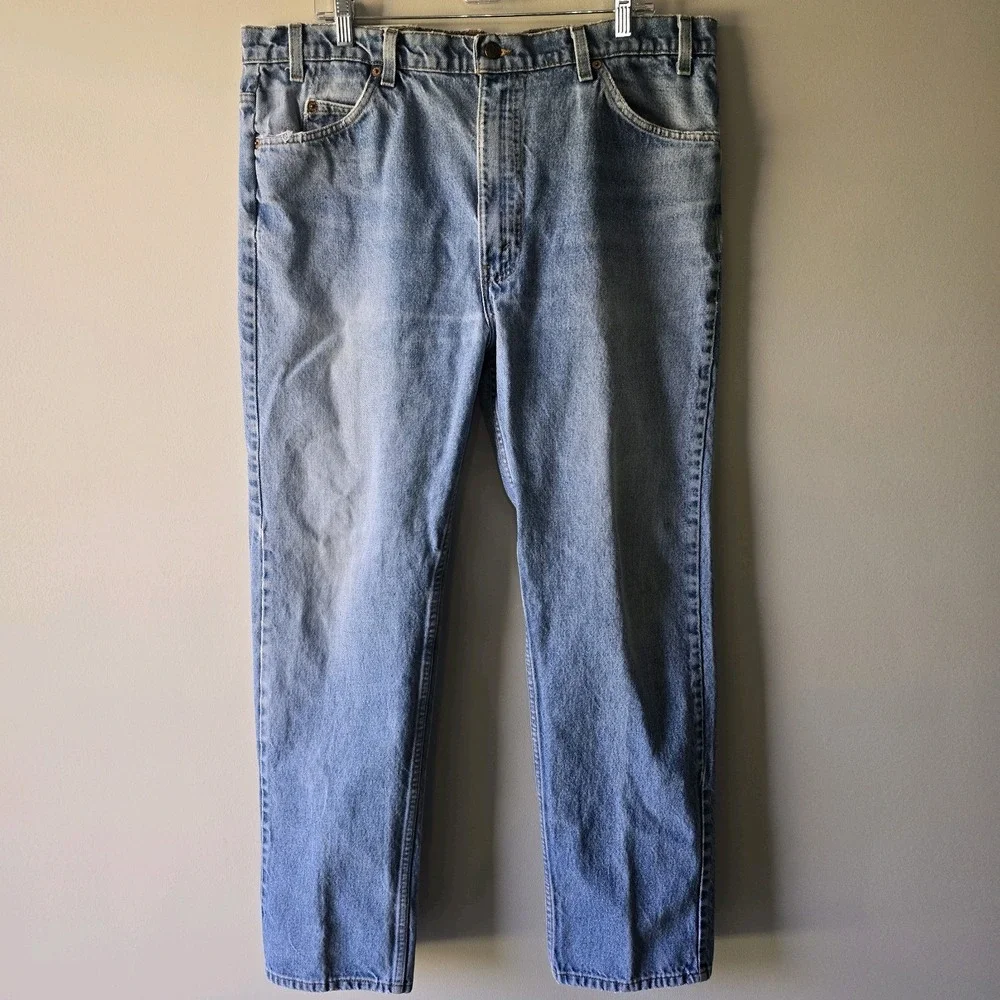 Vintage Levis 550 Relaxed Fit Tapered Leg Light Wash Orange Tab Jeans 40x32 Mens